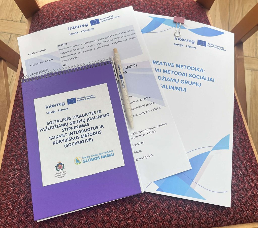The materials of the seminar on the chair - agenda, folder and a notebook The materials of the seminar on the chair - agenda, folder and a notebook
