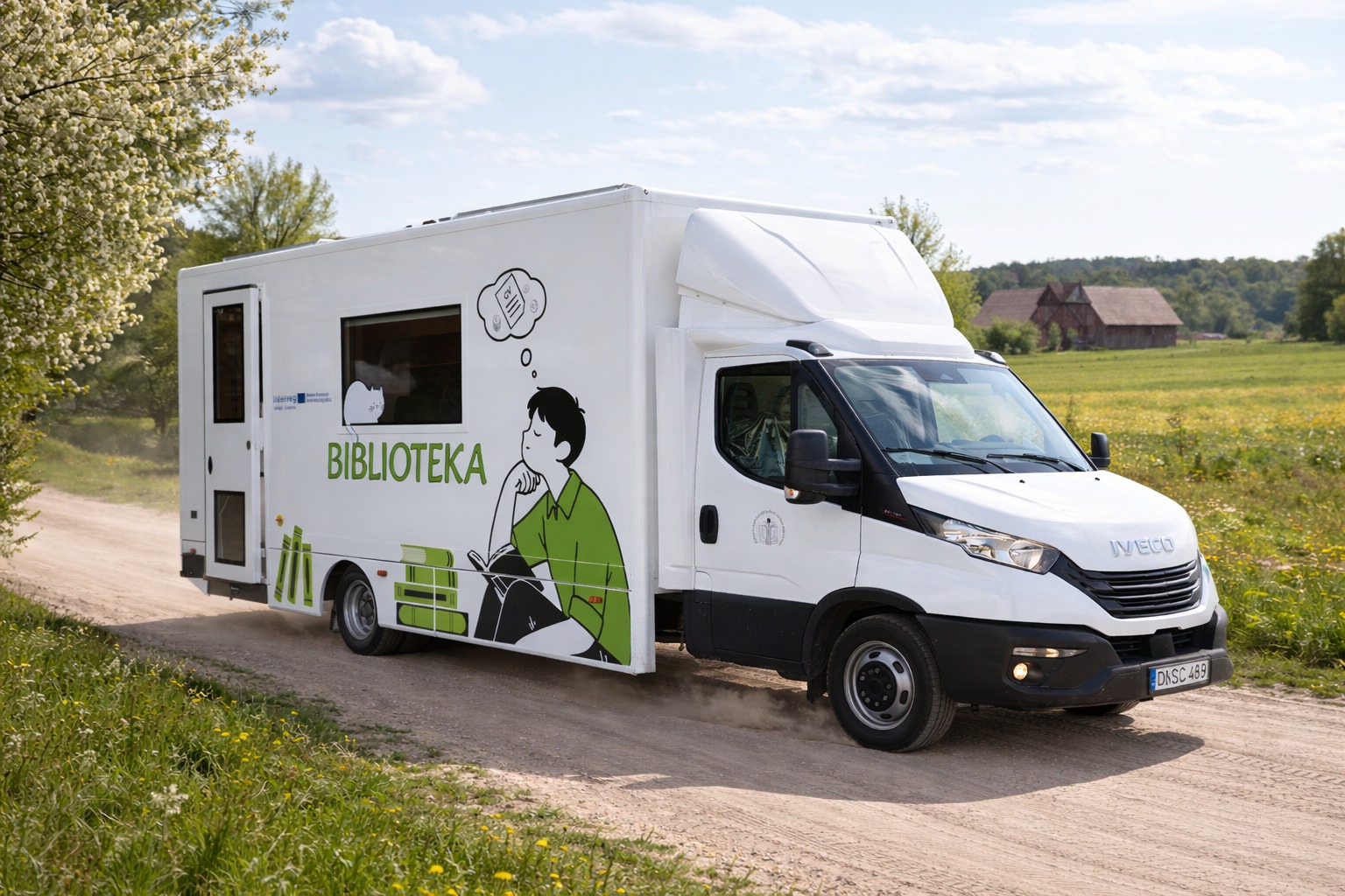 Mobile library vehicle with "Biblioteka" branding, parked on a dirt road surrounded by greenery, promoting literacy and access to books in rural areas.