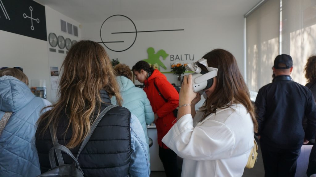 Participants engaging with virtual reality technology during a project partner event in the Klaipėda region, showcasing the BIRDIE project results.